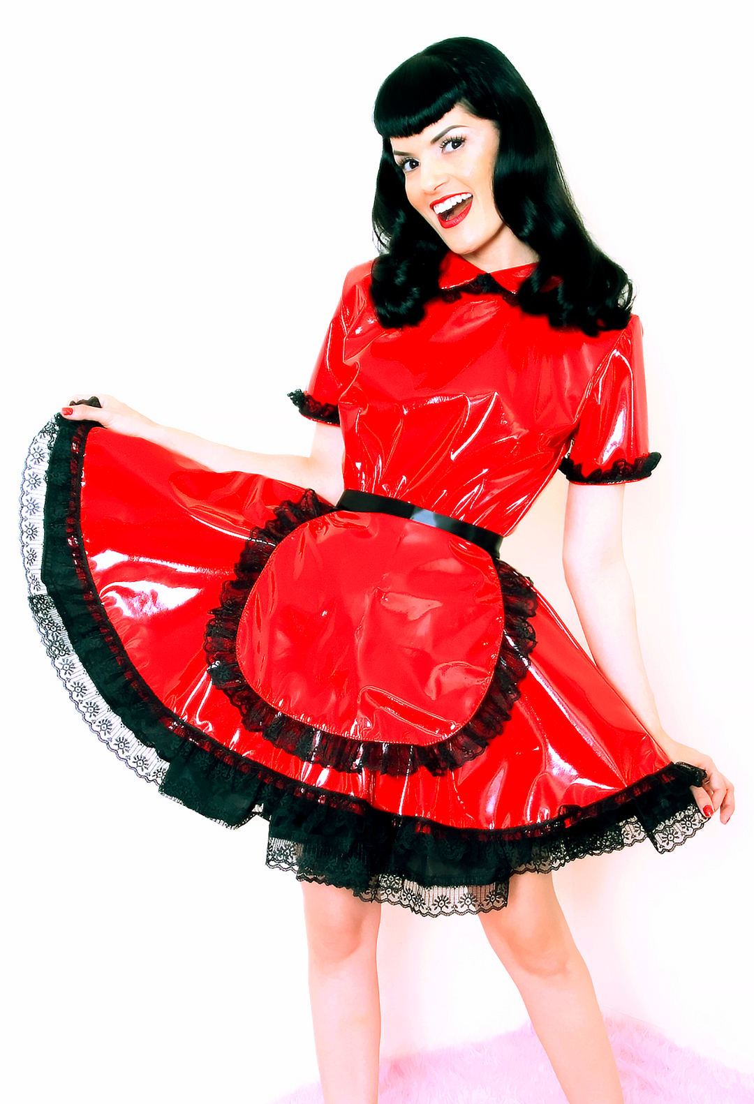 Bernie Dexter in original Versatile Fashions Lolita Maid Dress in red PVC w/ black lace trim